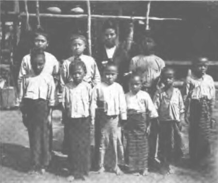 Village School Children With Their Teacher